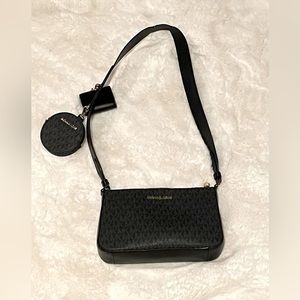 I am selling my Michael Kors purse. It is brand new, barely used.